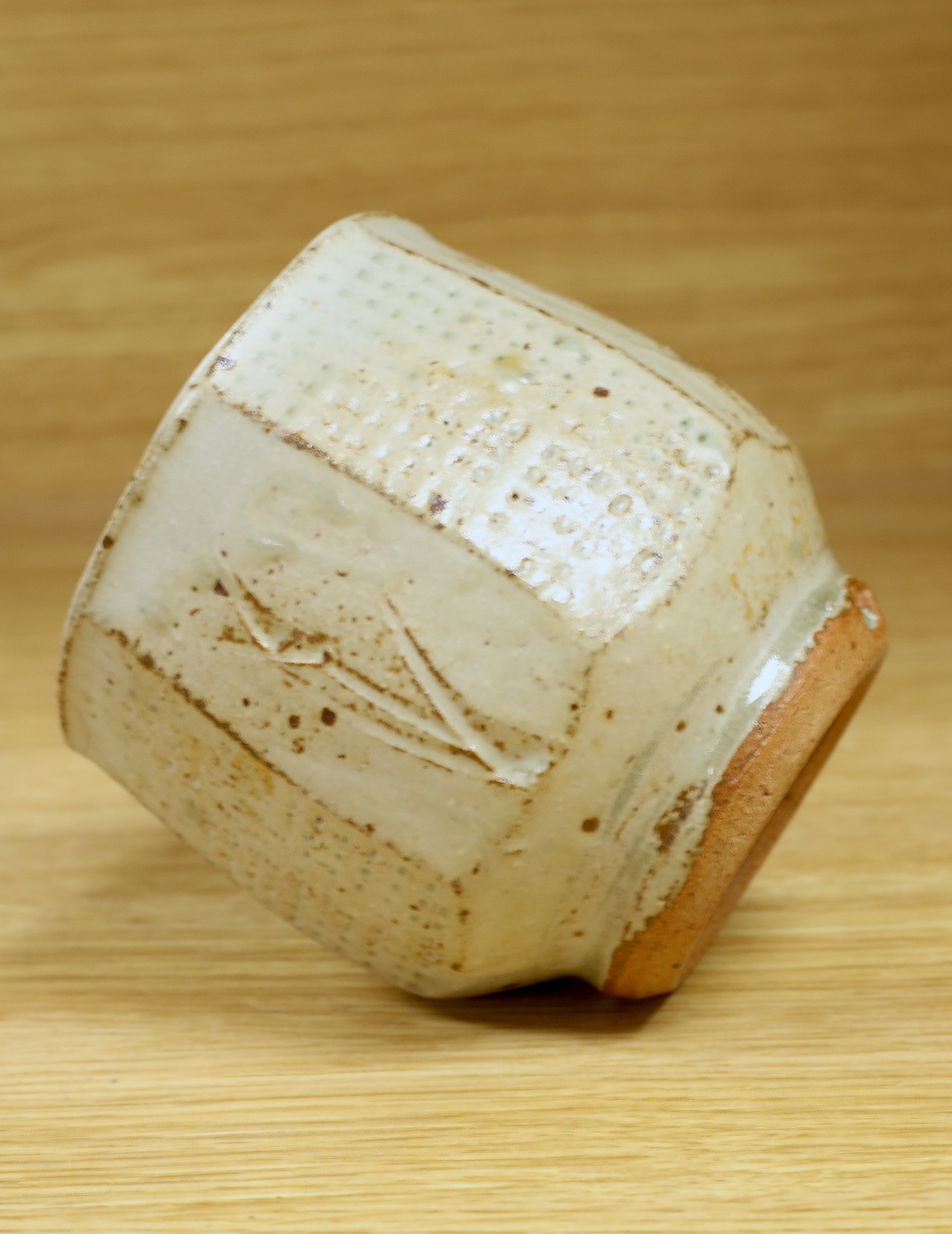 Phil Rogers (1951-2020), a studio pottery octagonal yunomi, 9cm. Condition - good, some crazing visible to interior